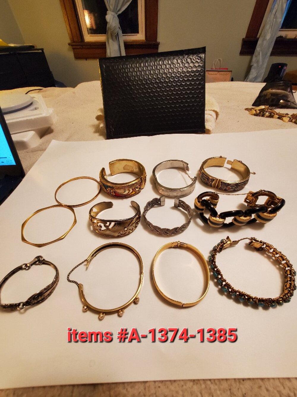 12 Bracelets, items # 1374-1385, wt.  392. grams.